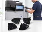 Cassette de levage engrenage Samsung JC66-03278A imprimée en 3D devant une imprimante MultiXpress