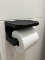 Dérouleur de papier toilette avec tablette