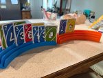 Porte-cartes à trois étages — jeu assis