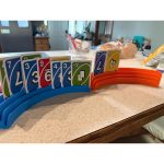Porte-cartes à trois étages — jeu assis