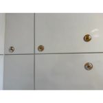 Organiseur mural pour appareil de coiffage et embouts