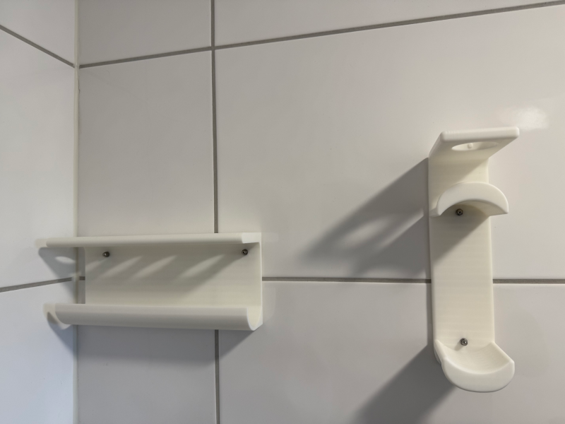 Organiseur mural pour appareil de coiffage et embouts