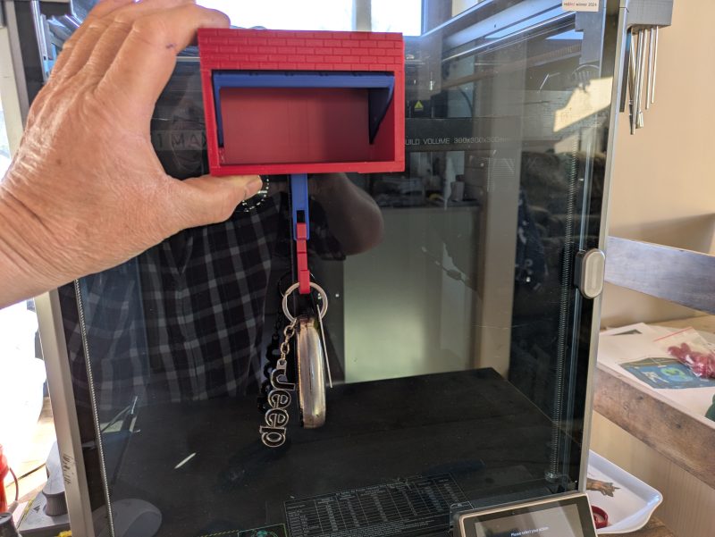 Porte-clé télécommande de garage — porte qui s'ouvre