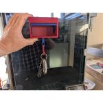 Porte-clé télécommande de garage — porte qui s'ouvre
