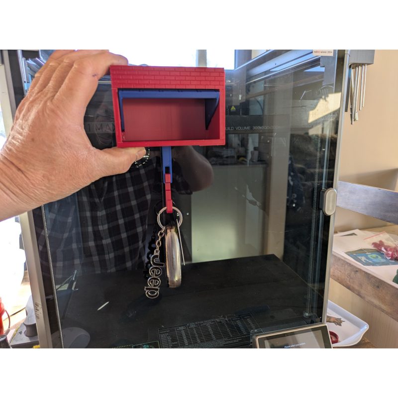 Porte-clé télécommande de garage — porte qui s'ouvre