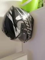 Crochet mural pour casque de moto