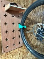 Support mural vertical pour vélo