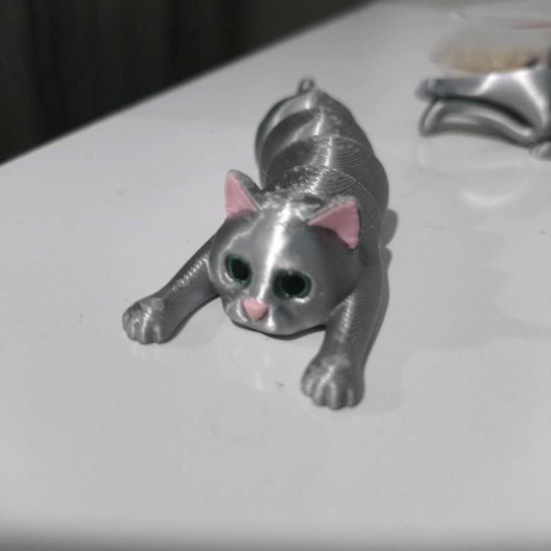 Chat articulé porte-objet — imprimé en place