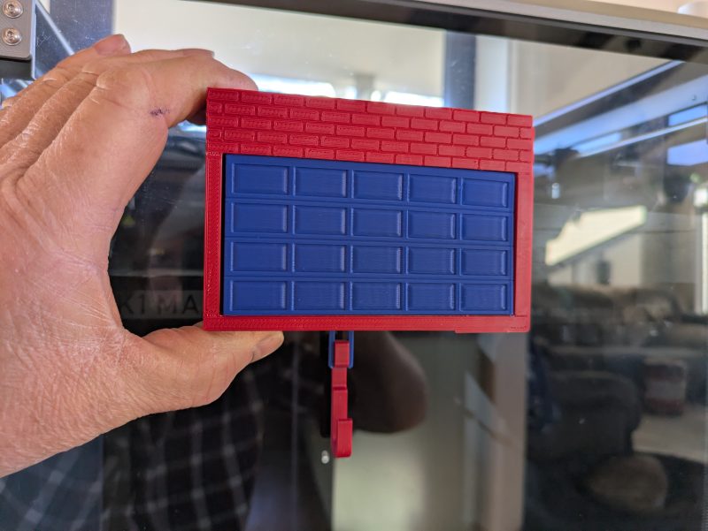 Porte-clé télécommande de garage — porte qui s'ouvre