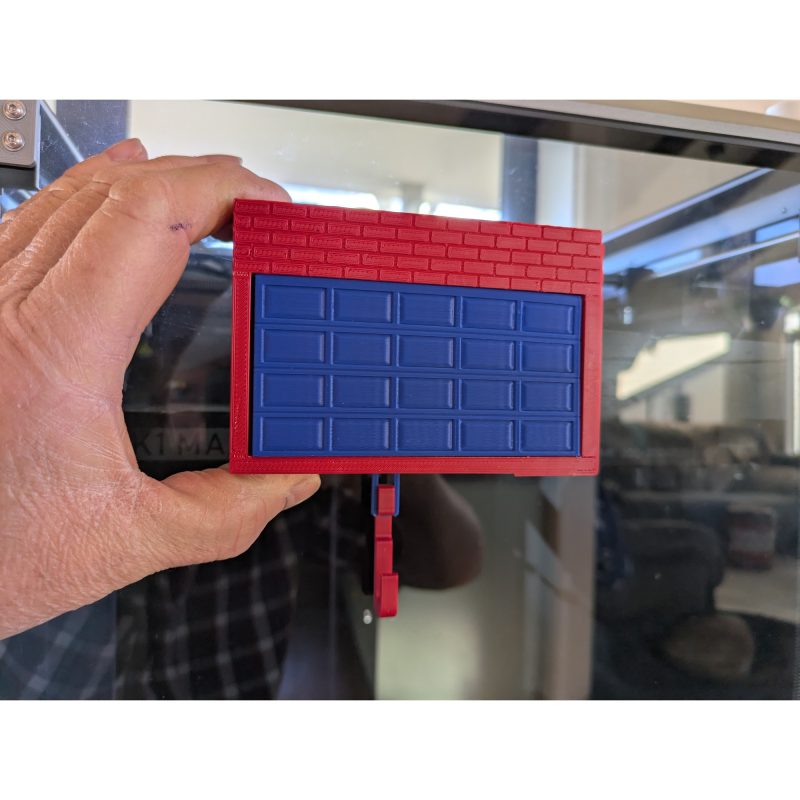 Porte-clé télécommande de garage — porte qui s'ouvre