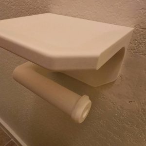 Dérouleur de papier toilette avec tablette