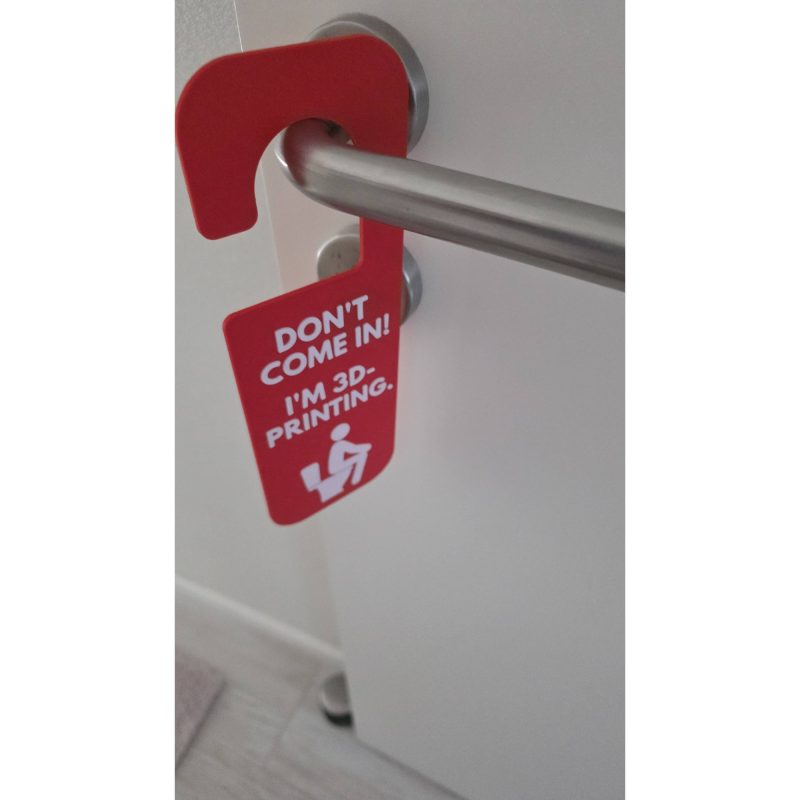 Plaque de porte pour toilettes — version qui fait sourire