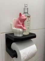 Dérouleur de papier toilette avec tablette