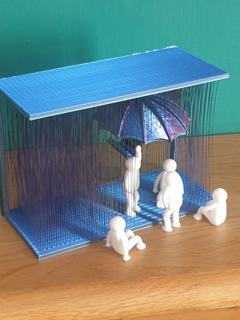 Tableau mural « À l'abri de la pluie »