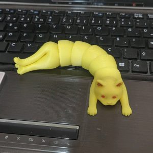 Chat articulé porte-objet — imprimé en place