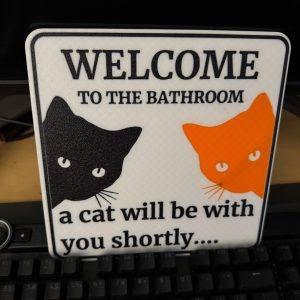 Plaque de toilettes « un chat va s'occuper de vous »